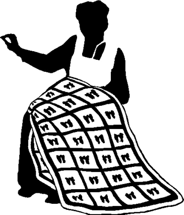woman-sewing-a-quilt